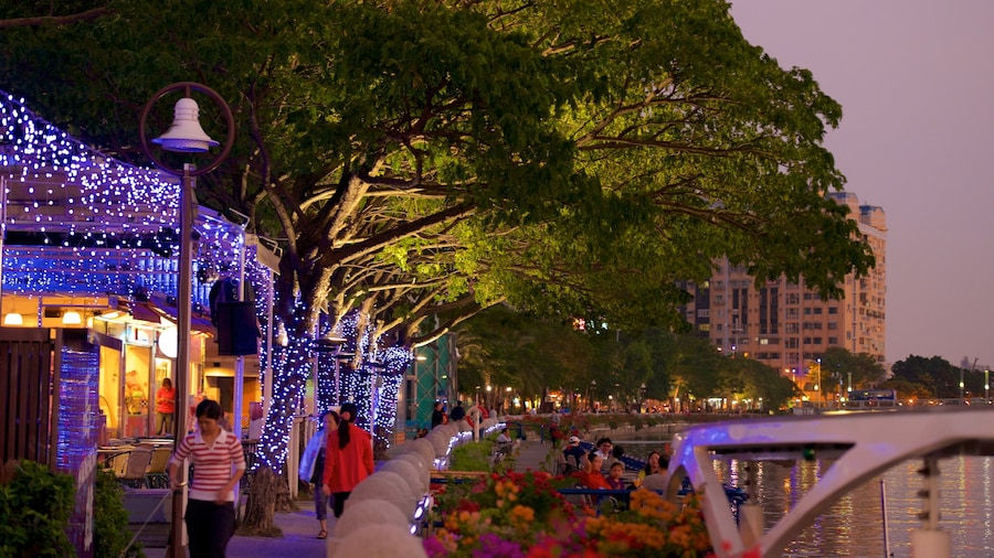 Love River which includes a city and night scenes