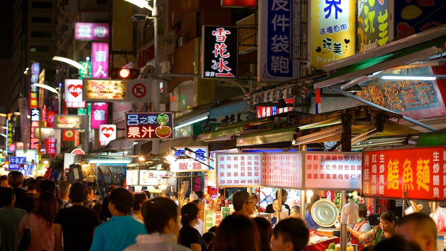 Liuhe Night Market which includes a city, night scenes and markets