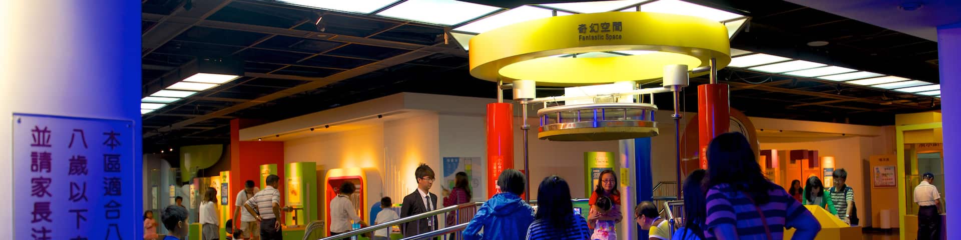 National Museum of Natural Science showing interior views as well as a small group of people
