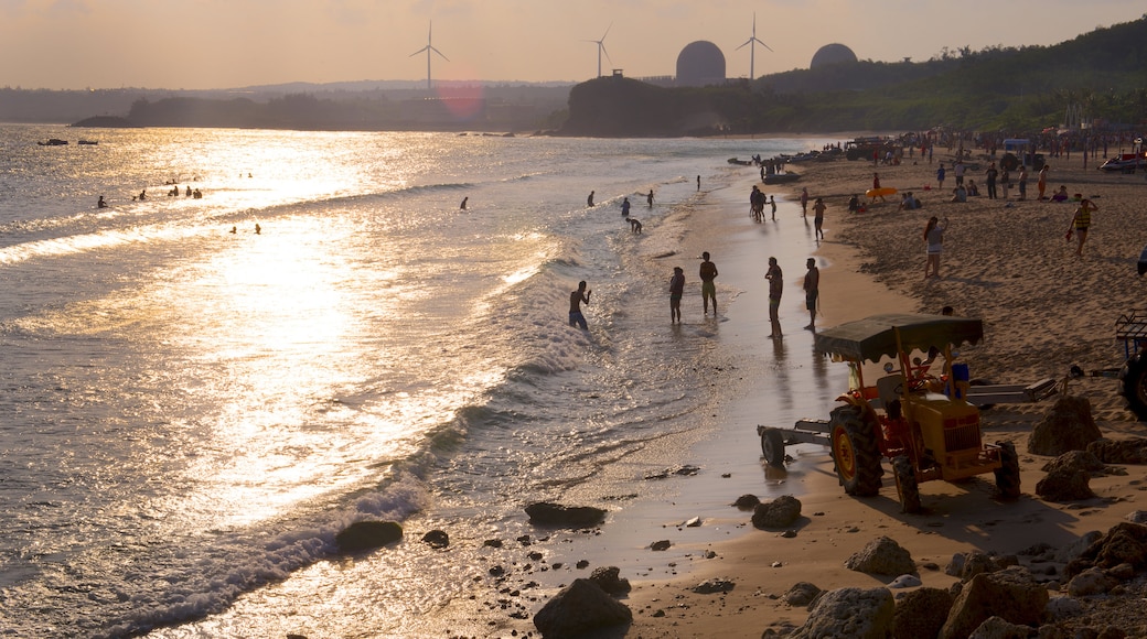 Nan Wan Beach showing a sandy beach and a sunset