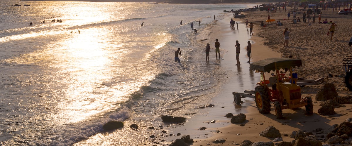 Nan Wan Beach which includes a beach and a sunset