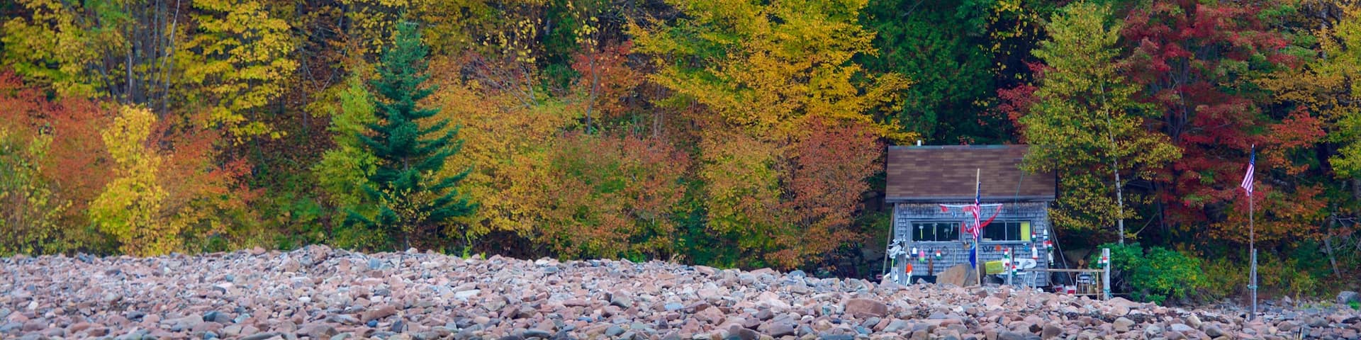 Acadia - North Coast which includes fall colors, forest scenes and a house