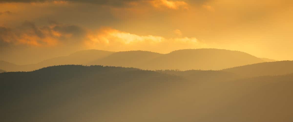 Burlington which includes a sunset and a lake or waterhole