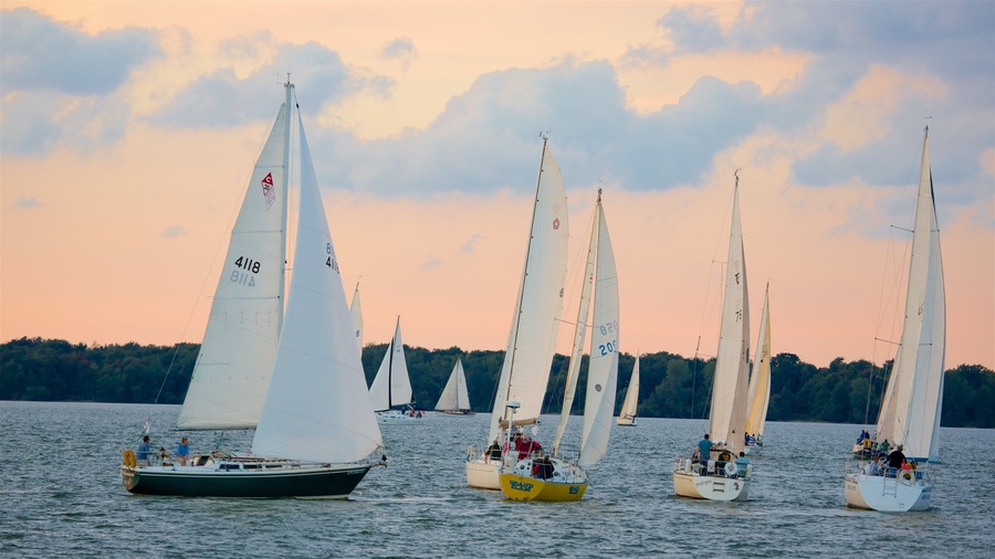 Erie showing a sunset, a lake or waterhole and sailing
