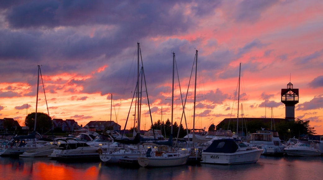 Erie which includes a sunset, a bay or harbor and sailing