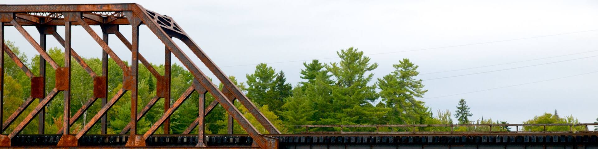 Greenville which includes a bridge, a river or creek and fishing