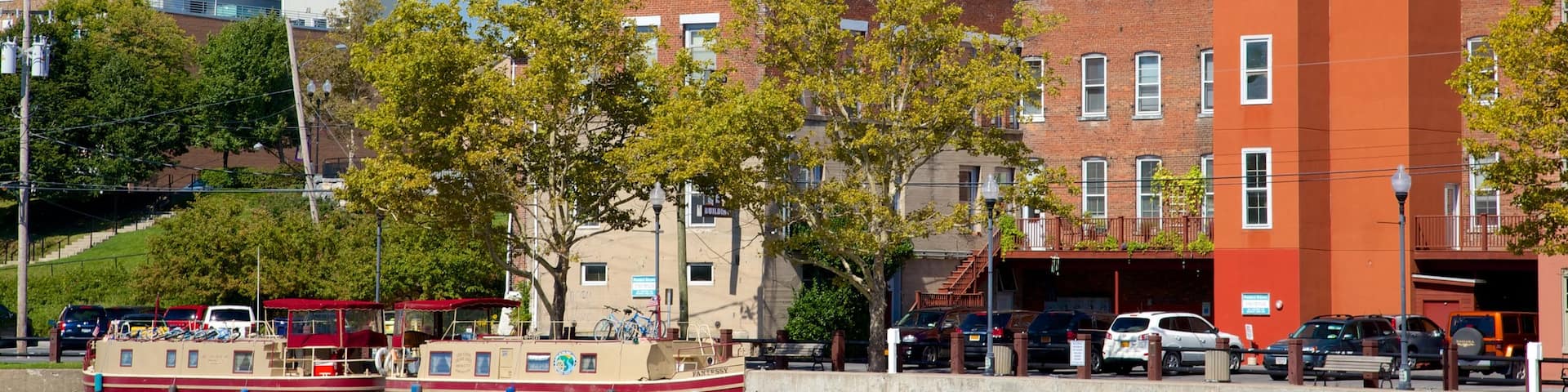 Seneca Falls which includes heritage architecture and a river or creek