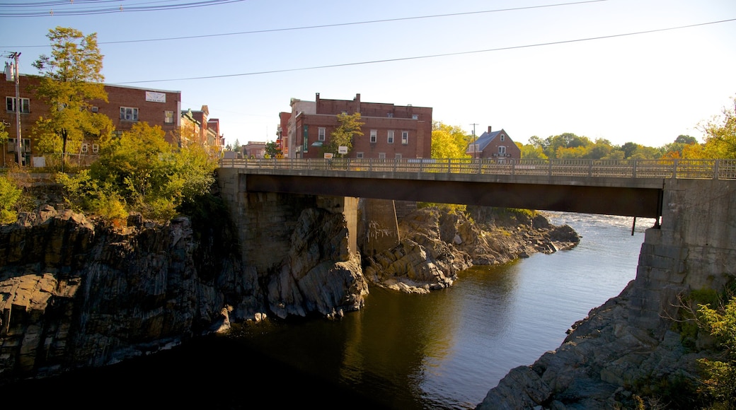 Skowhegan featuring a bridge and a river or creek