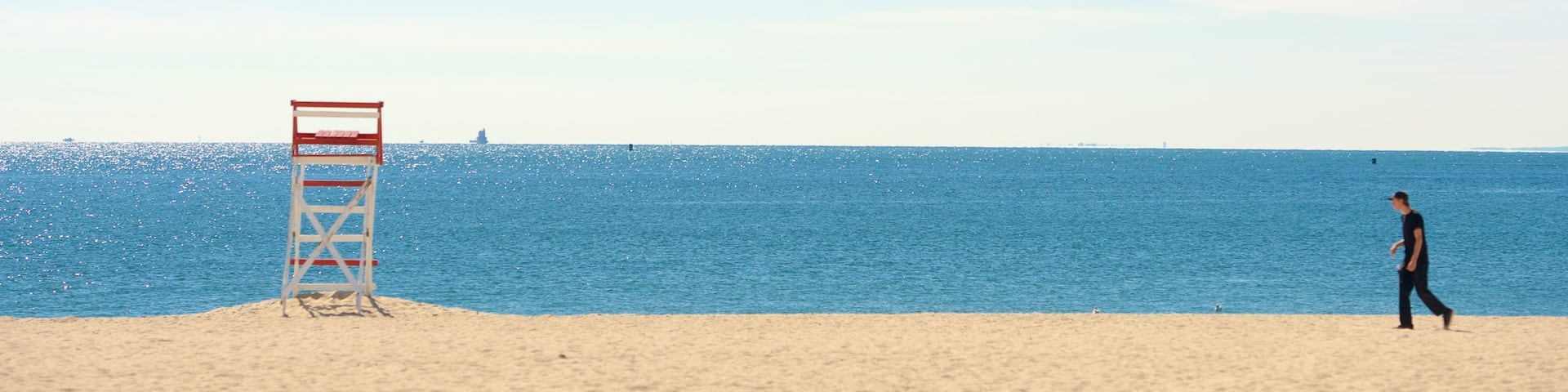 Ocean Beach Park que incluye una playa de arena