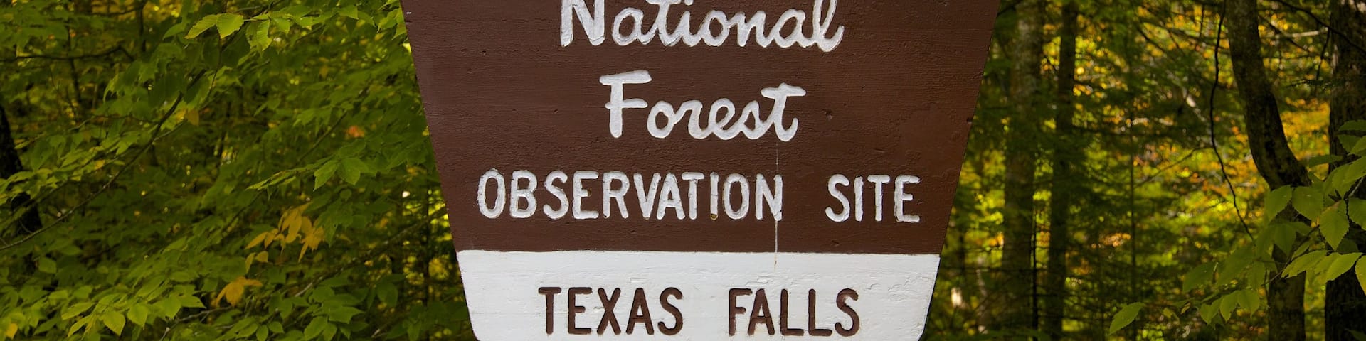 Green Mountain National Forest which includes forests and signage