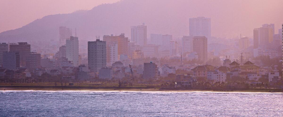 Son Tra Mountain showing a coastal town and mist or fog