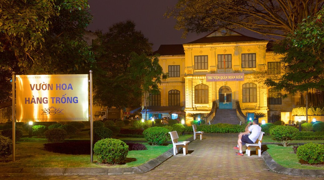 Hanoi which includes night scenes and heritage architecture as well as an individual male