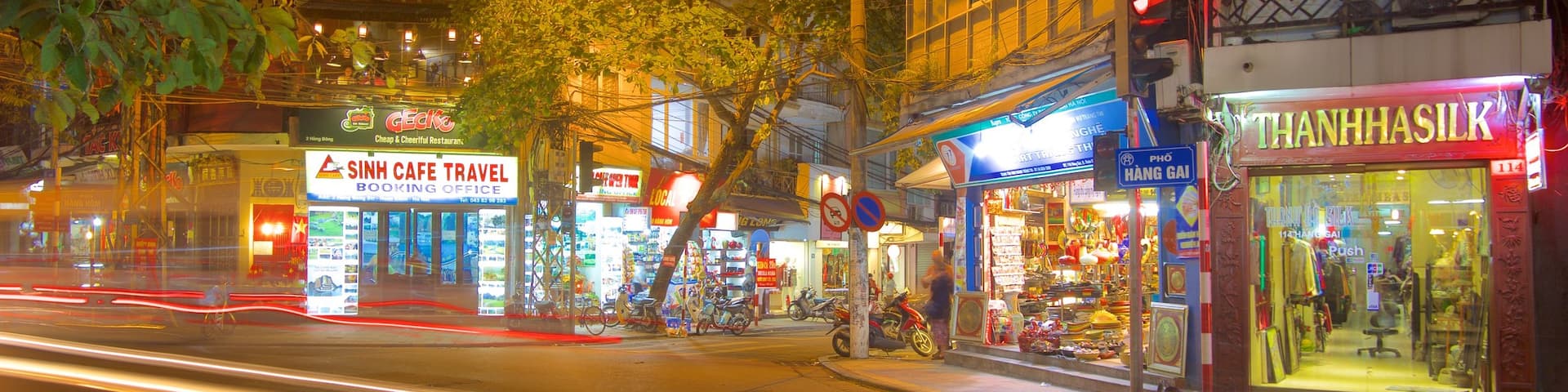 Hanoi showing signage, night scenes and street scenes
