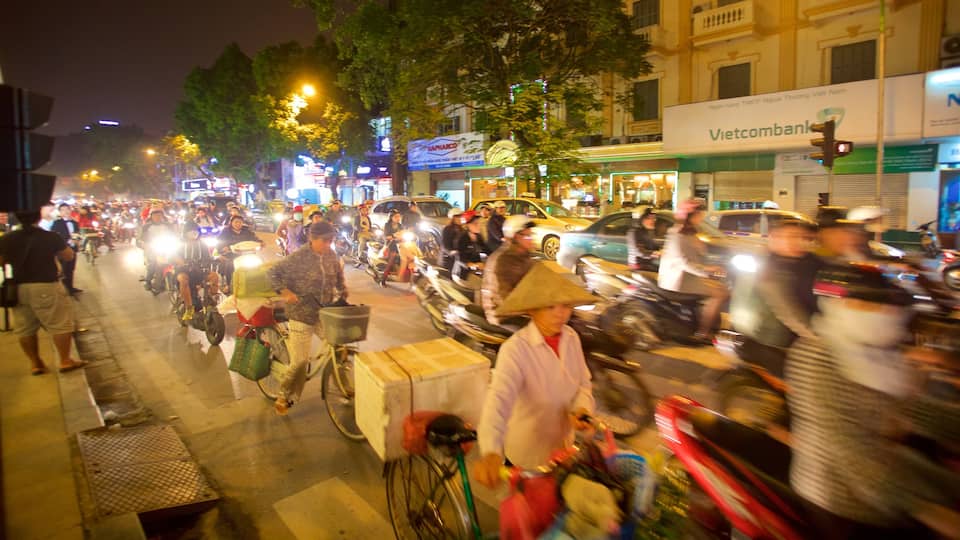 Hanoi showing street scenes and motorbike riding