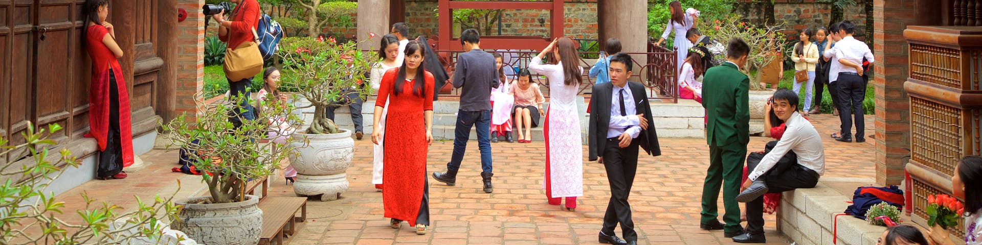 Temple of Literature showing a temple or place of worship as well as a large group of people