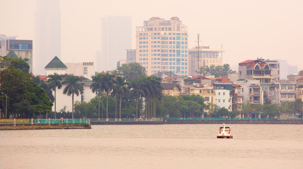 Tay Ho showing a lake or waterhole, a city and boating