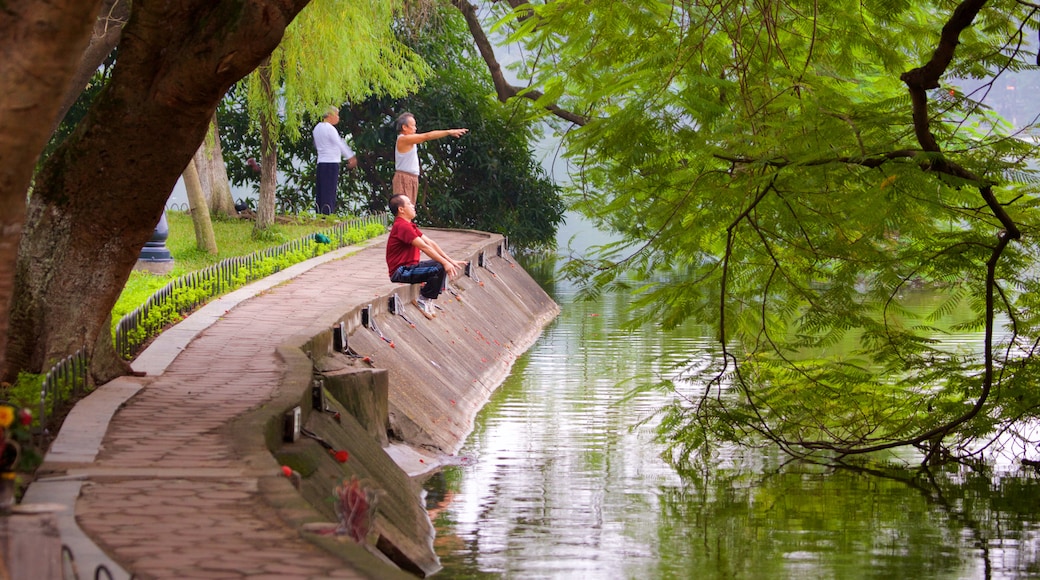 Hoan Kiem Lake featuring a lake or waterhole and a garden