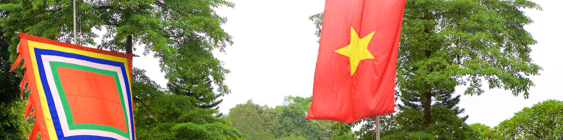 Temple of Literature featuring a temple or place of worship and a park as well as a large group of people