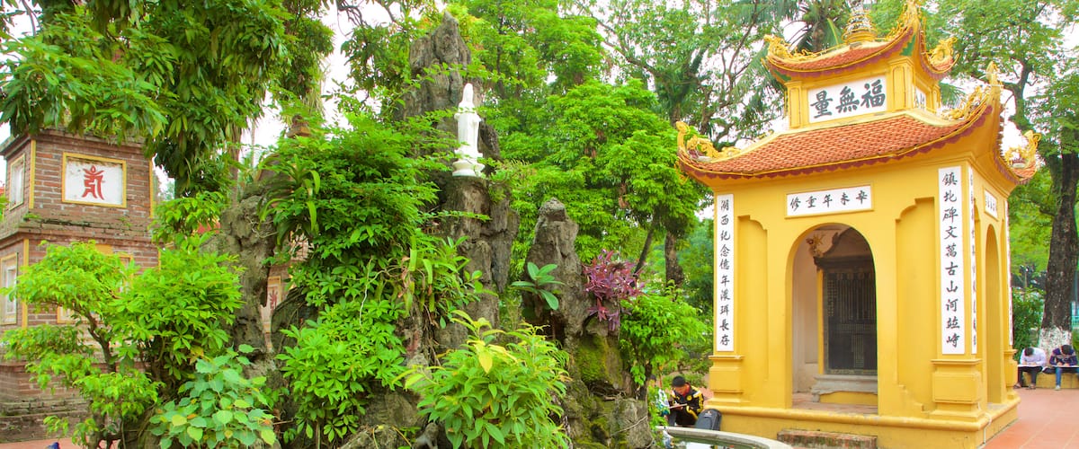 Tran Quoc Pagoda which includes a fountain, a garden and a temple or place of worship