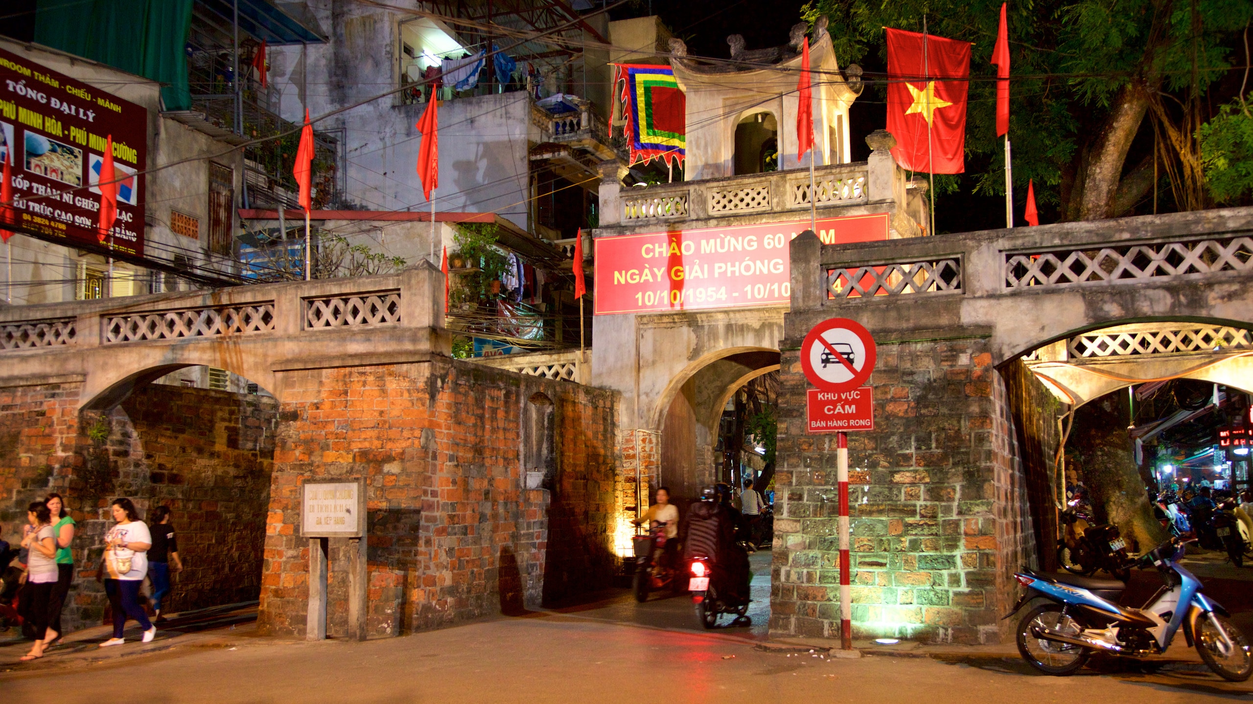 Hanoi Old City Gate featuring a city and night scenes