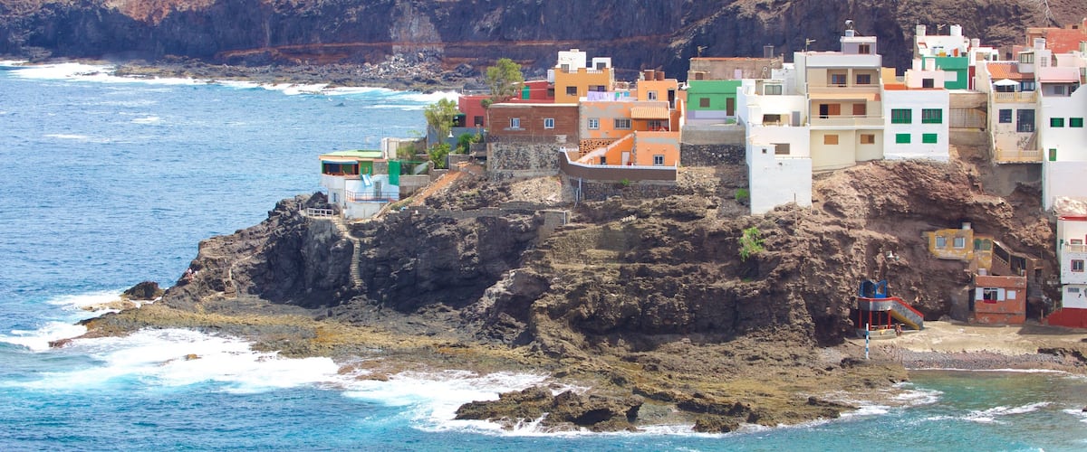 Gran Canaria mostrando vistas generales de la costa, una ciudad costera y costa escarpada