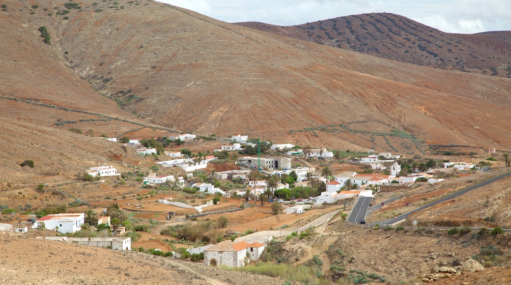 Betancuria featuring a small town or village and desert views