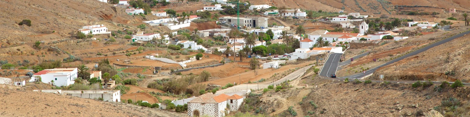 Betancuria featuring desert views and a small town or village