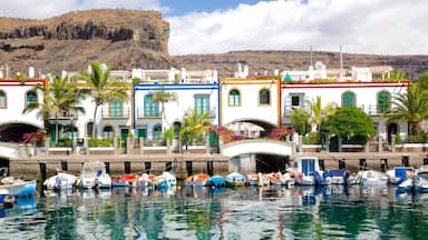 Puerto de Mogan which includes boating, a bay or harbour and a coastal town