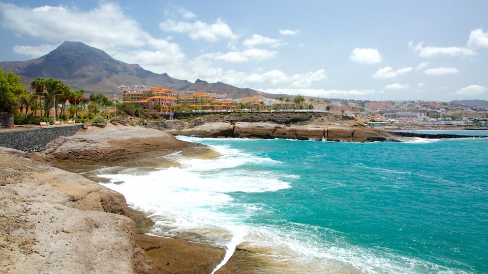 Adeje showing rocky coastline and mountains