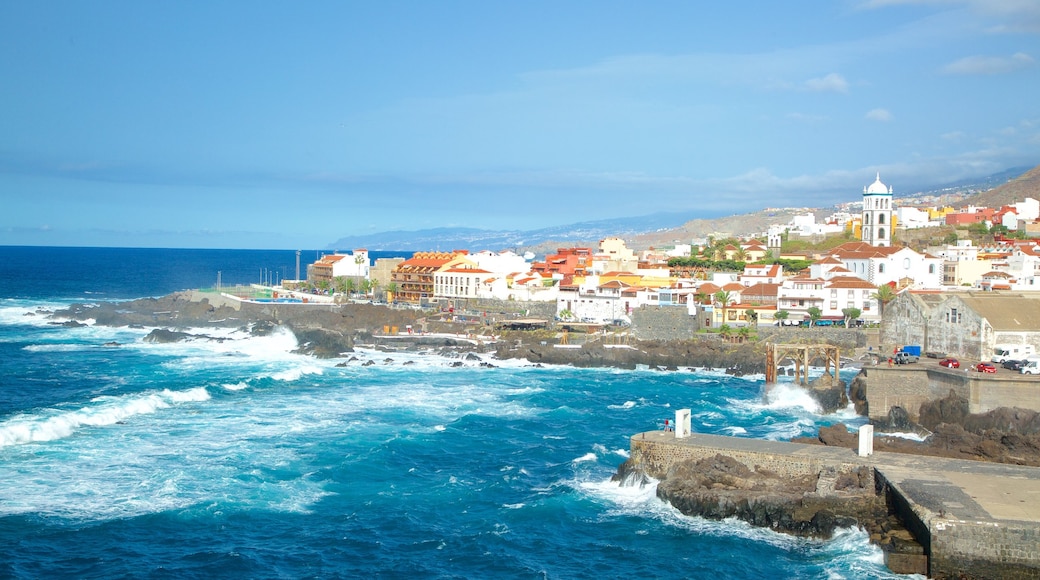 Garachico featuring surf, rugged coastline and a coastal town