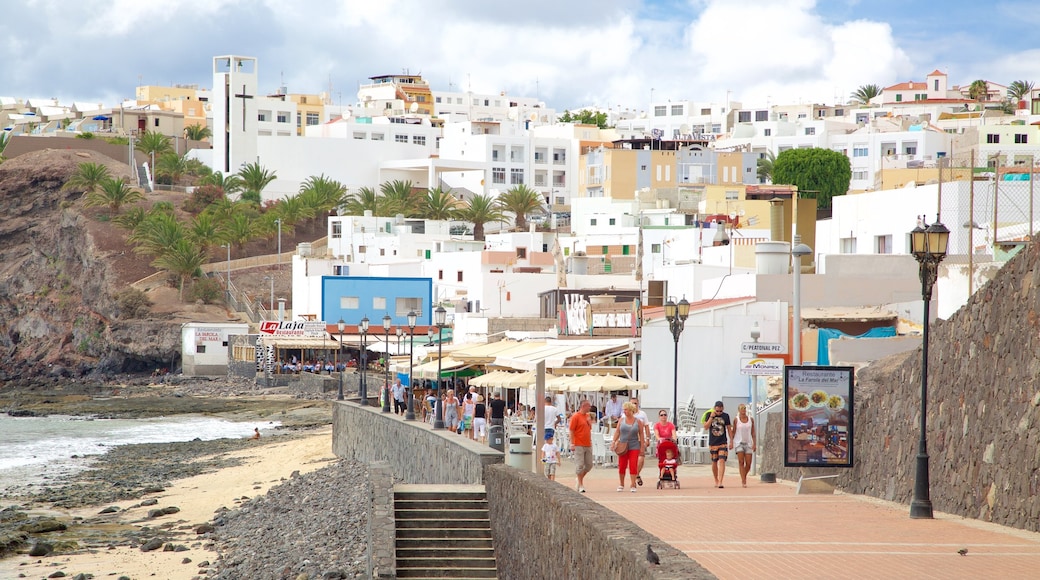 Morro Jable showing a coastal town and a beach