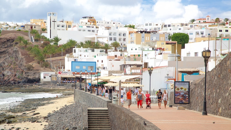 Morro Jable showing a coastal town and a beach