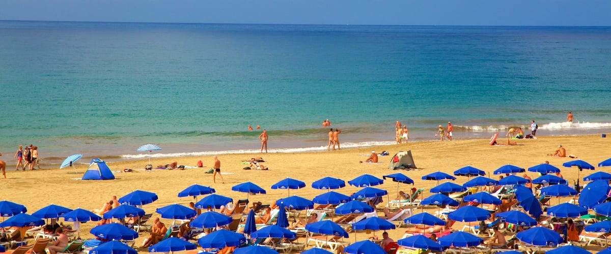 Meloneras inclusief een strand en algemene kustgezichten