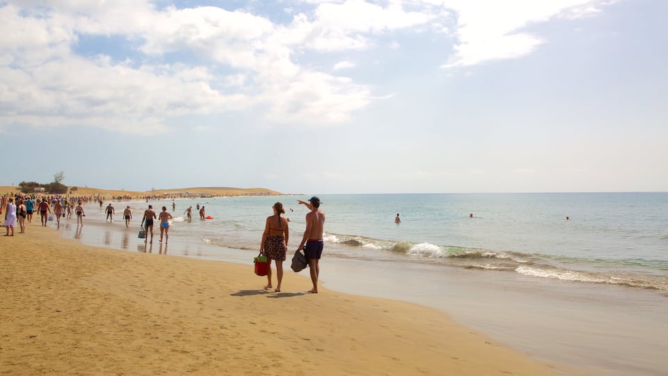 Meloneras showing a beach and general coastal views