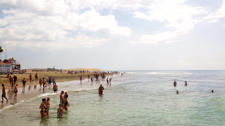 Meloneras which includes a beach, swimming and general coastal views