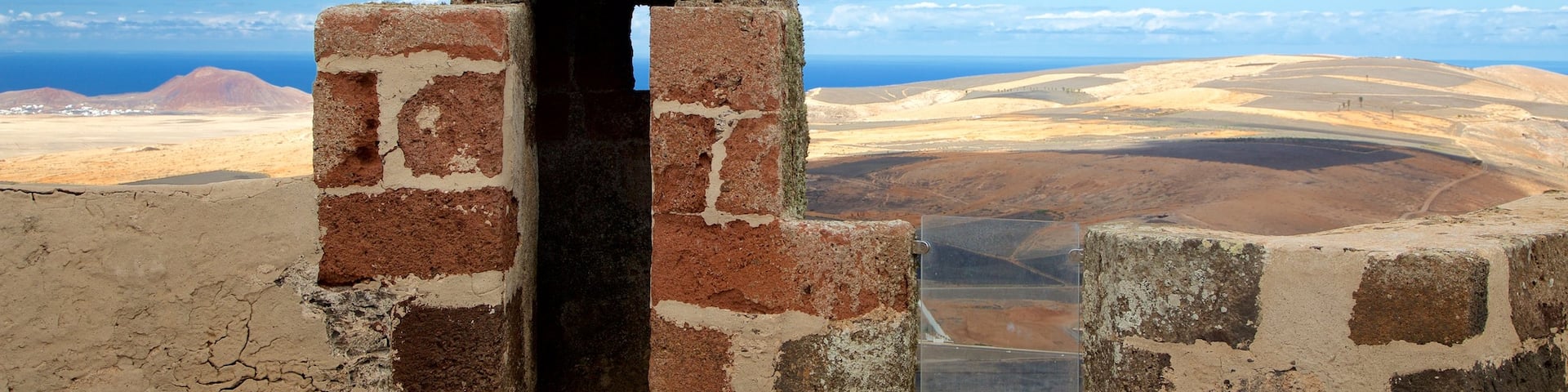 Santa Barbara Castle featuring a castle and desert views