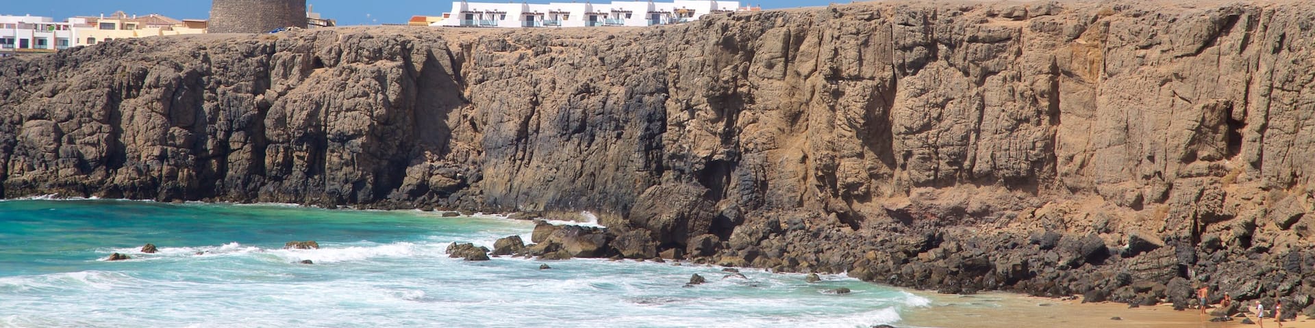 Cotillo Beach showing rugged coastline, general coastal views and a beach