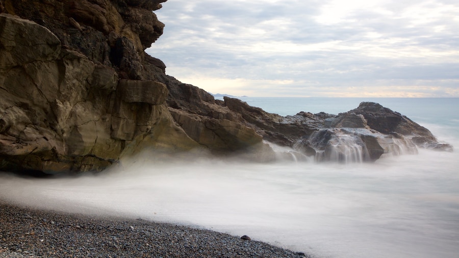 Ajuy Beach showing mist or fog, general coastal views and rocky coastline