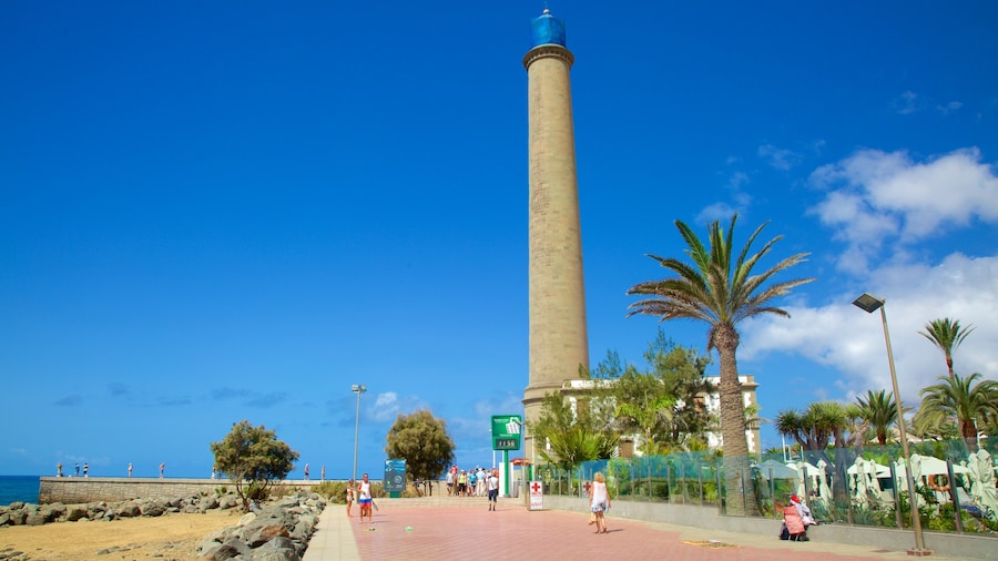 Maspalomas Lighthouse showing general coastal views, a sandy beach and a lighthouse