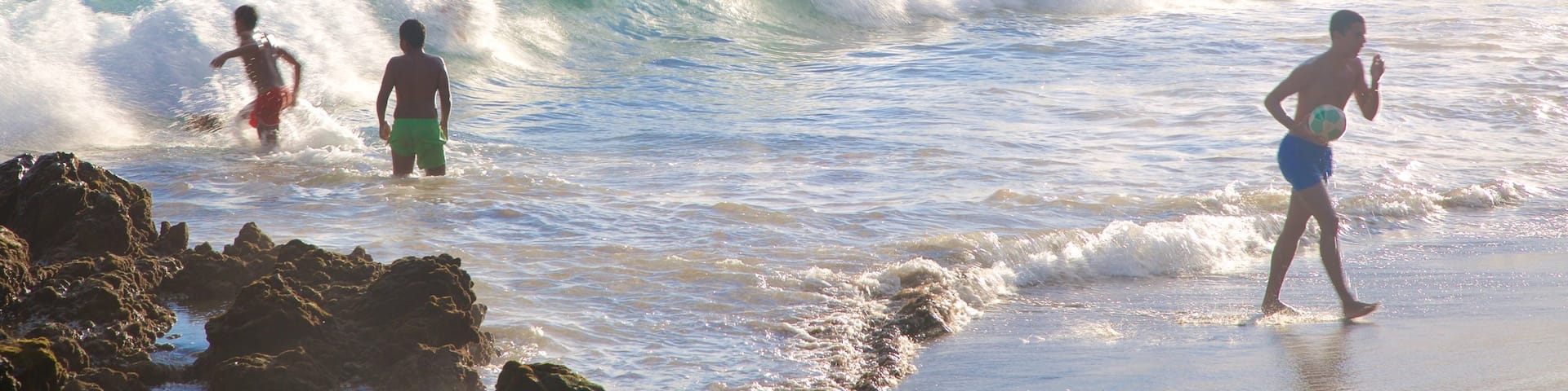 Puerto del Carmen featuring swimming, surf and a beach