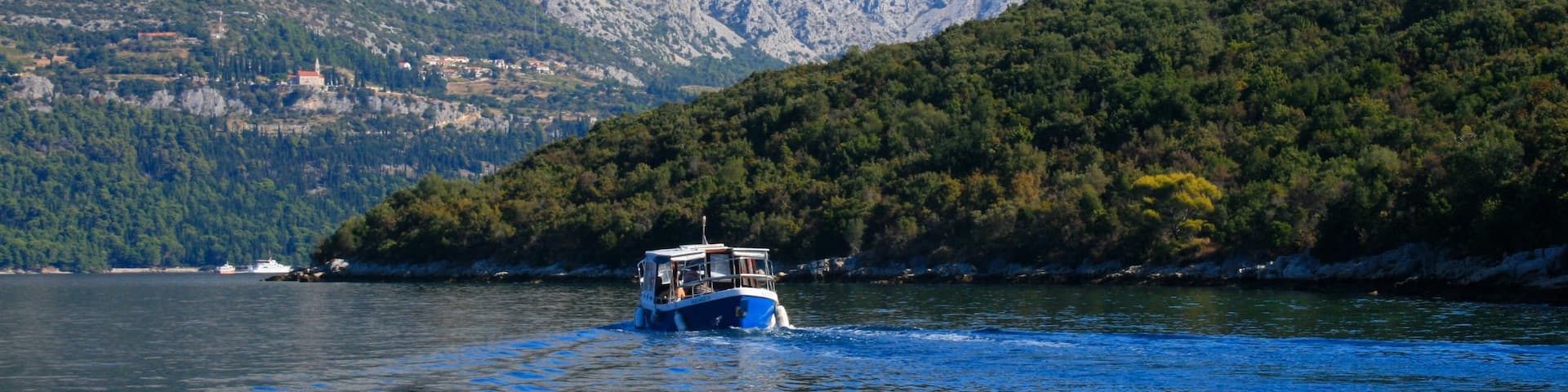 Croatia which includes boating, a lake or waterhole and mountains