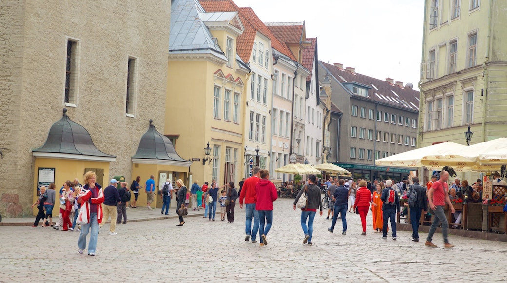 Town Hall Square featuring heritage architecture as well as a large group of people