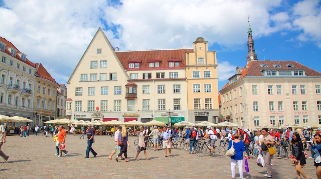 Town Hall Square which includes a square or plaza and heritage architecture as well as a large group of people