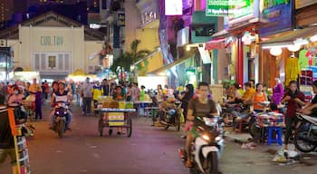 Ben Thanh Market featuring shopping, night scenes and markets