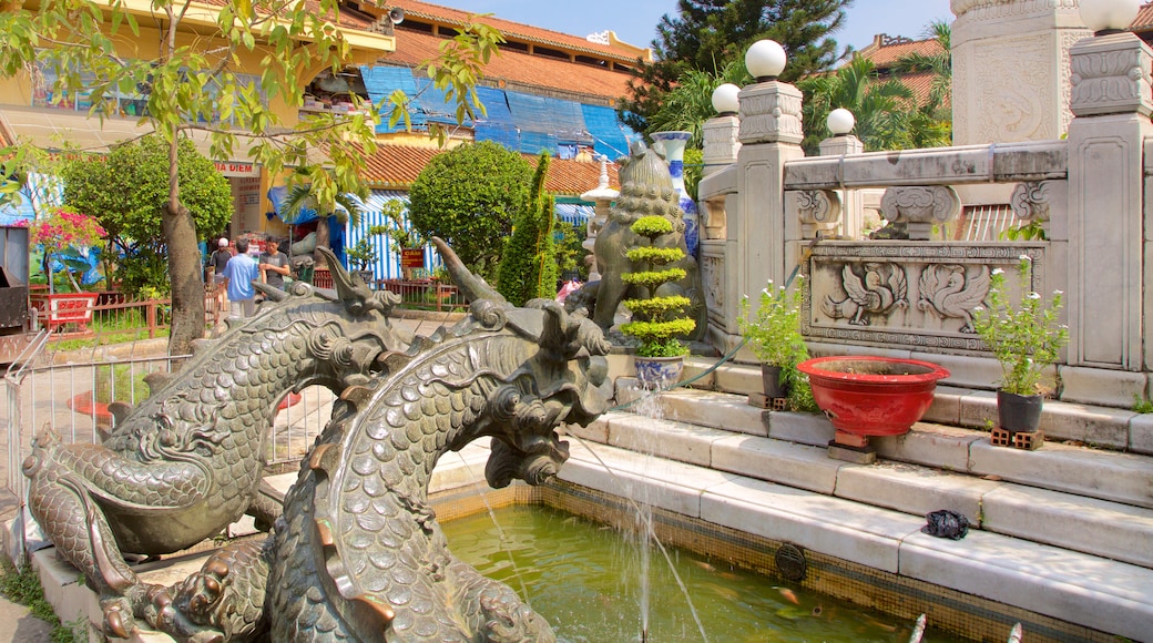 Cholon featuring a garden and a fountain