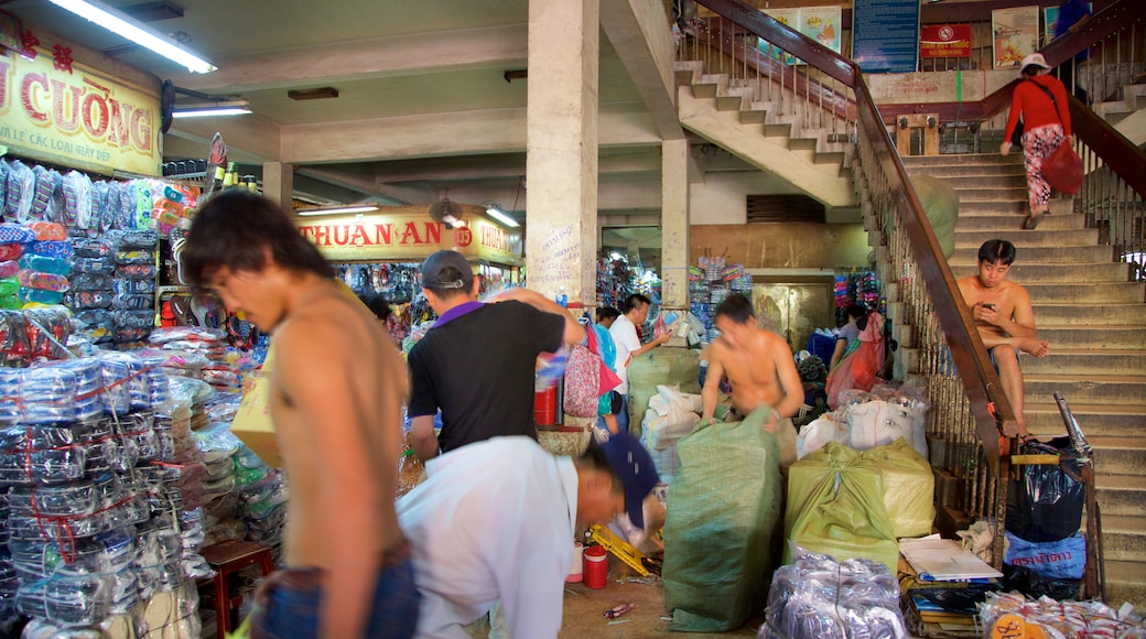 Cholon which includes interior views, shopping and markets