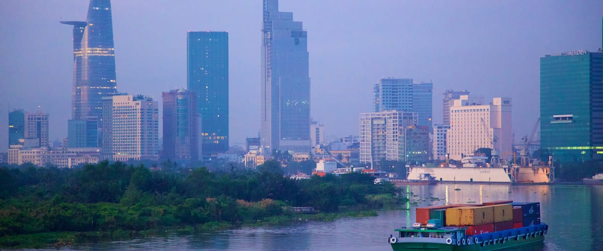 Saigon River which includes skyline, boating and a river or creek