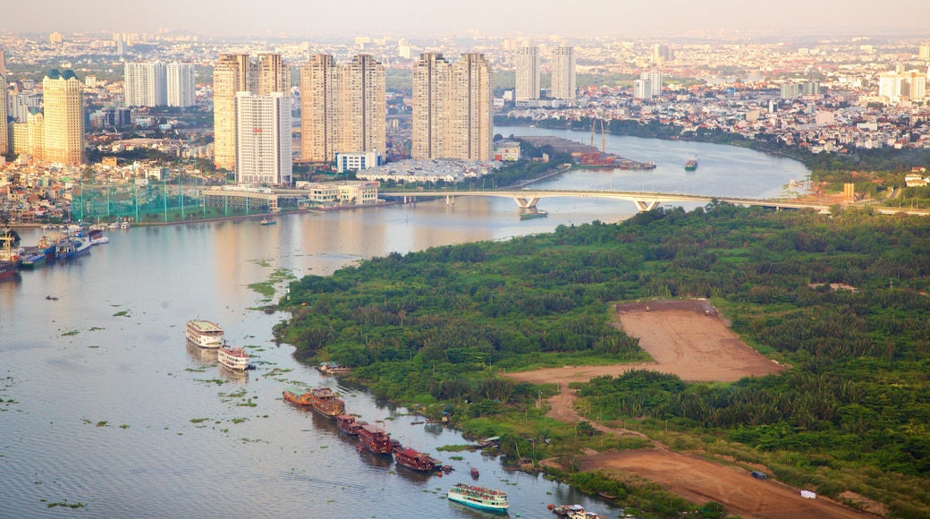 Saigon River showing a river or creek, a city and boating