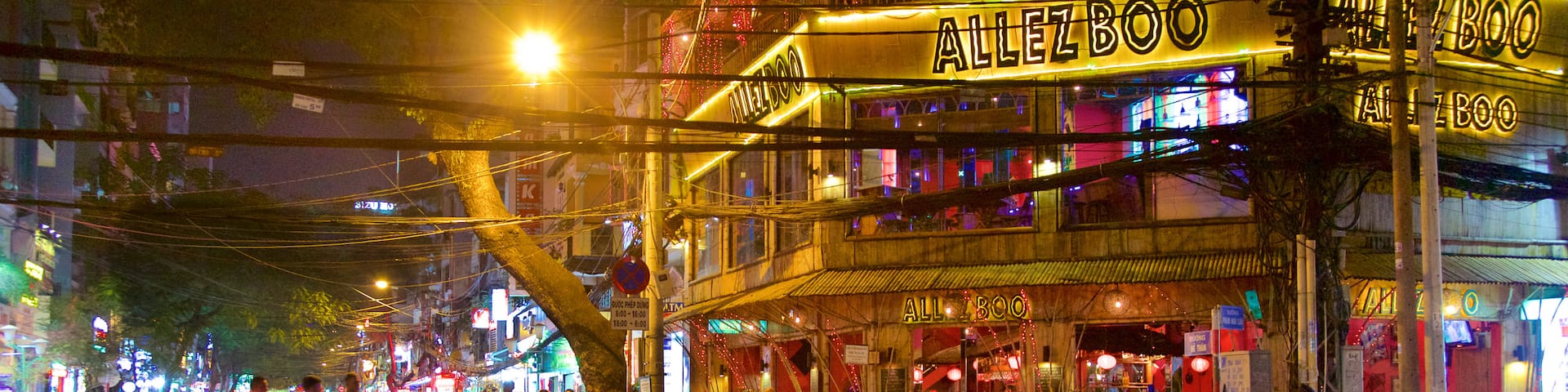 Pham Ngu Lao Street which includes night scenes, shopping and street scenes