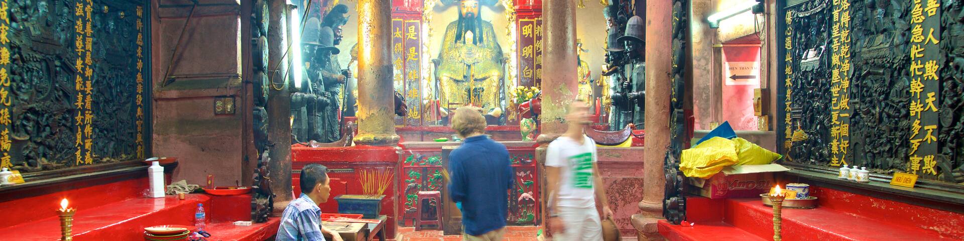 Jade Emperor Pagoda which includes religious elements, interior views and a temple or place of worship